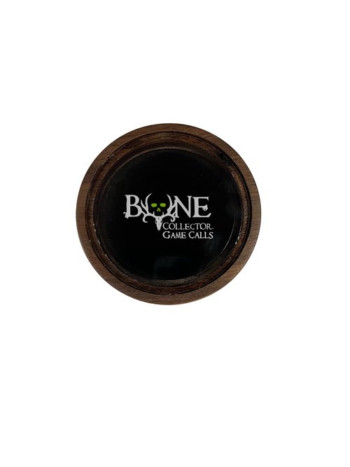 Bone Collector Dynamite Walnut Pot Call ??Compact Turkey Call with Clear Glass Surface ??Diamondwood Striker for Precise, Resonant Calls ??High-Volume, Premium Hunting Call