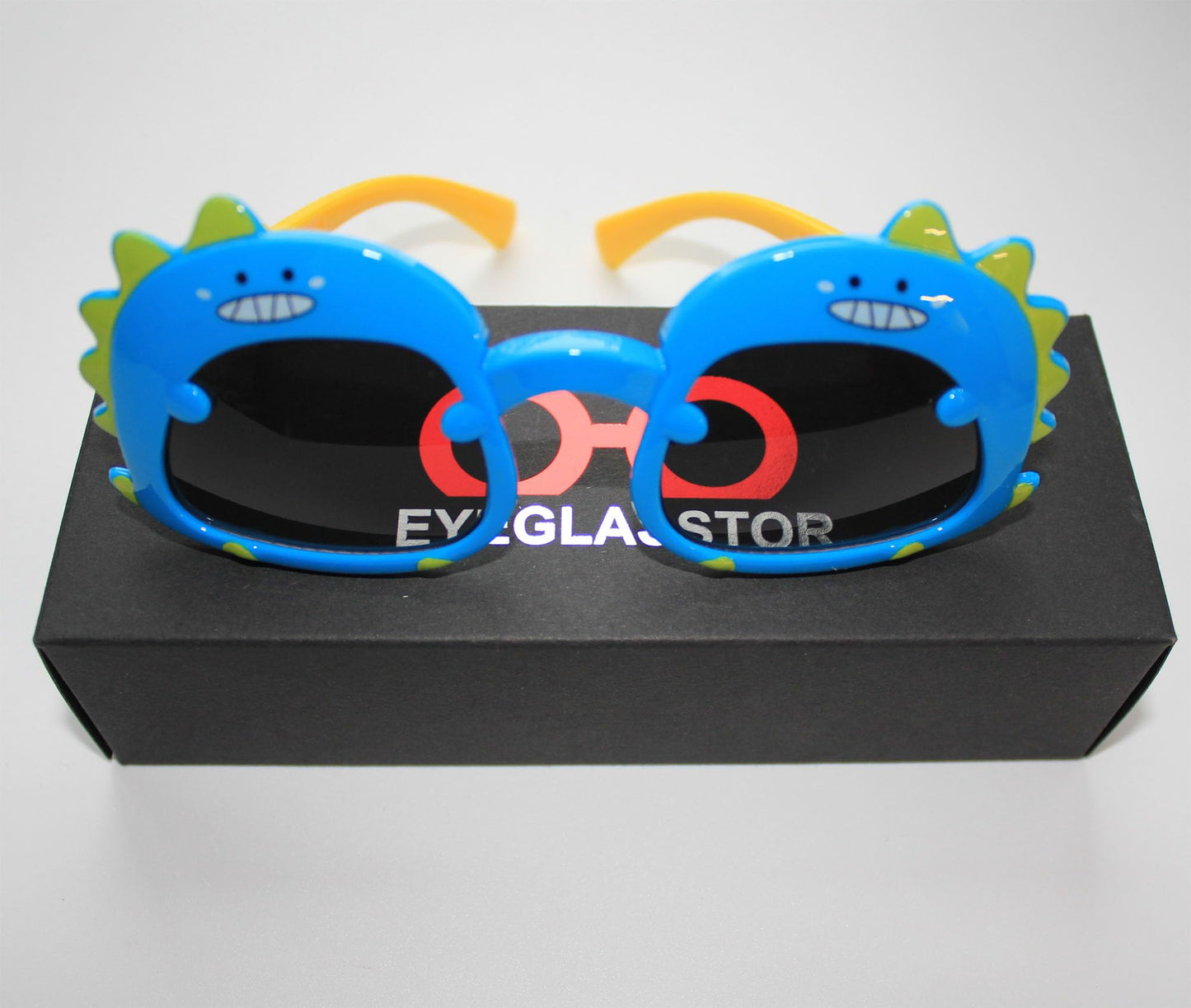 EYEGLASSTOR Dinosaur Cartoon Toddler Sunglasses for Kids Aged 2-6, Blue & Yellow Dark Lenses, UV400 Protection, Secure Fit for Outdoor Play