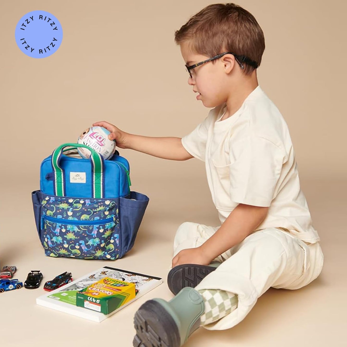 Itzy Ritzy Toddler Backpack - Daycare Bag - Features Adjustable Shoulder Straps, 2 Side Pockets & Spacious Interior with Wipeable Fabric Lining & Name Label, Strawberry Backpack