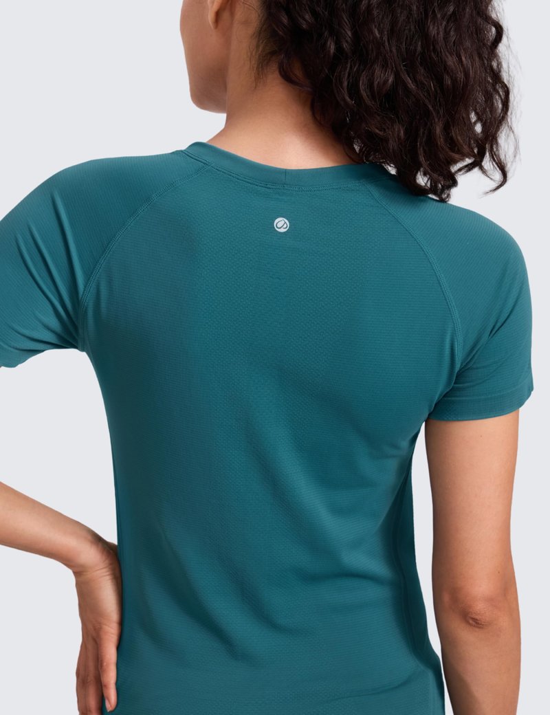 CRZ YOGA Seamless Workout Tops for Women Hip Length - Athletic Running Gym Yoga Short Sleeve Shirts Breathable Crewneck Tees Green Jade XX-Small