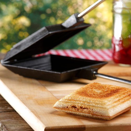 Coghlan's Cast Iron Camp Cooker - Pre-Seasoned Pie Iron Sandwich Maker with Heat-Resistant, Removable Handles, Easy-to-Clean for Toasted Pies, Grilled Sandwiches, and Meats, For Campfire Cooking