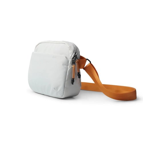 Allett Daily Crossbody Bag for Women & Men | 4L Lightweight Recycled Sling for Travel & Everyday Use | Hidden Passport Pocket, Sunglasses Slot | Water-Resistant Nylon, Adjustable Strap | Lunar Ash