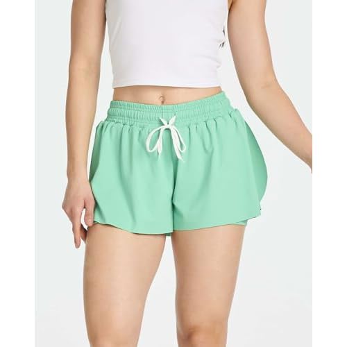 Real Essentials 4 Pack:Womens Flowy Dry Fit Running Short - Spandex Underneath Workout Summer Shorts (Available in Plus Size)