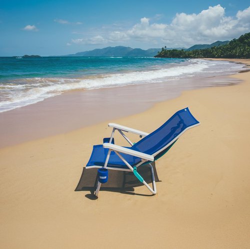 Shibumi Beach Chair. Anti-Rust Marine Grade Frame. 300lb Capacity. Weighs 8 Pounds. Adjustable Padded Backpack Straps. Breathable Fabric.