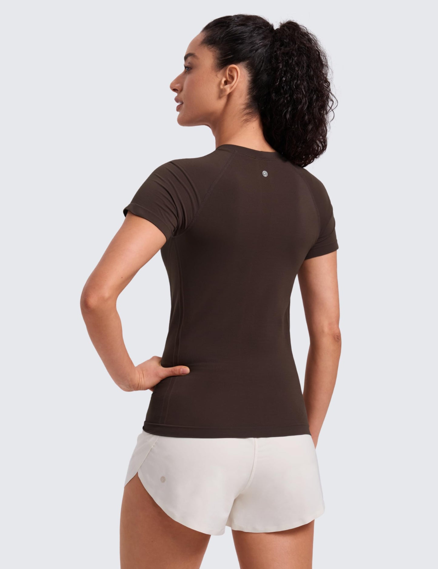 CRZ YOGA Seamless Workout Tops for Women Hip Length - Athletic Running Gym Yoga Short Sleeve Shirts Breathable Crewneck Tees Hot Fudge Brown X-Small