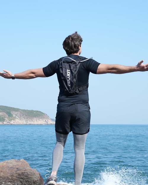 Zelvot Running Vest with 2L Water Bladder, USA Original Patent, Lightweight Adjustable Chest Pack with Pistol Holster, Reflective Running Hydration Vest for Women Men for Hiking Marathon