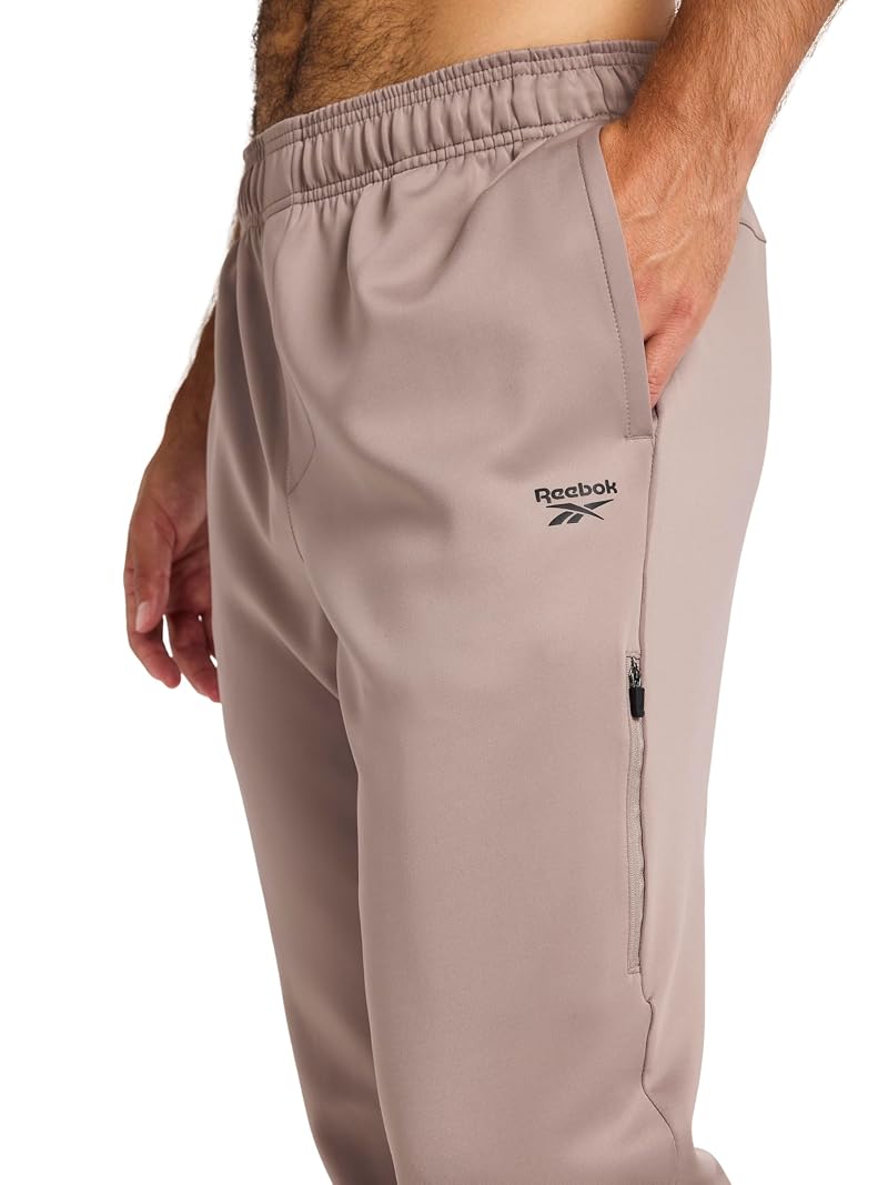 Reebok Men’s Grind Tapered Oblong Pant – Driftwood, Small (30” Inseam)