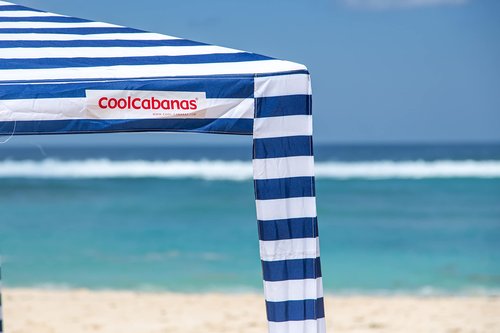 CoolCabana Beach Shade Tent - Easy Setup, UPF 50+ Protection, Large & Medium Sizes, Compact & Wind Resistant - Beach Cabana for The Whole Family - Navy Stripes, Medium