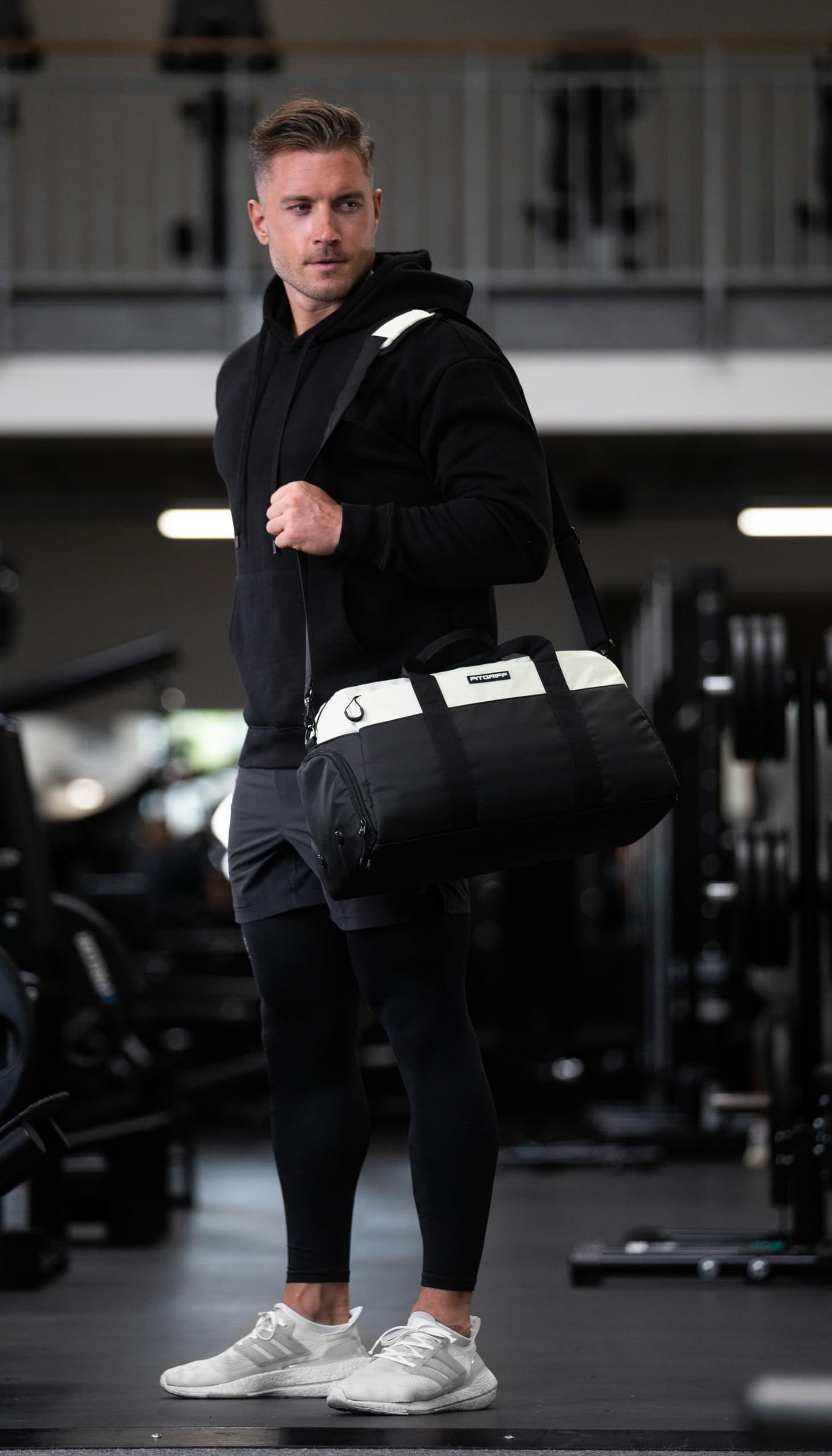 Fitgriff® Gym Bag V2 for Men and Women with Shoe & Wet Compartment - Duffle Bag for Travel, Sports, Fitness and Workout (Black/Cream White, 22 x 12 x 13″ (Medium))