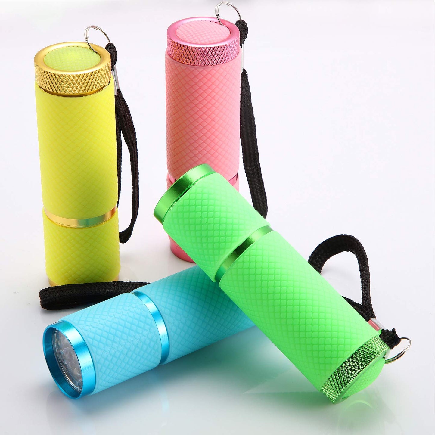 Mudder 8 Pieces Glow in Dark Flashlights Set, 9 LED Mini Flashlights Rubber Coated with Handle, LED Fluorescent Aluminum Portable Flashlight for Parties, Hiking, Camping, 4 Colors