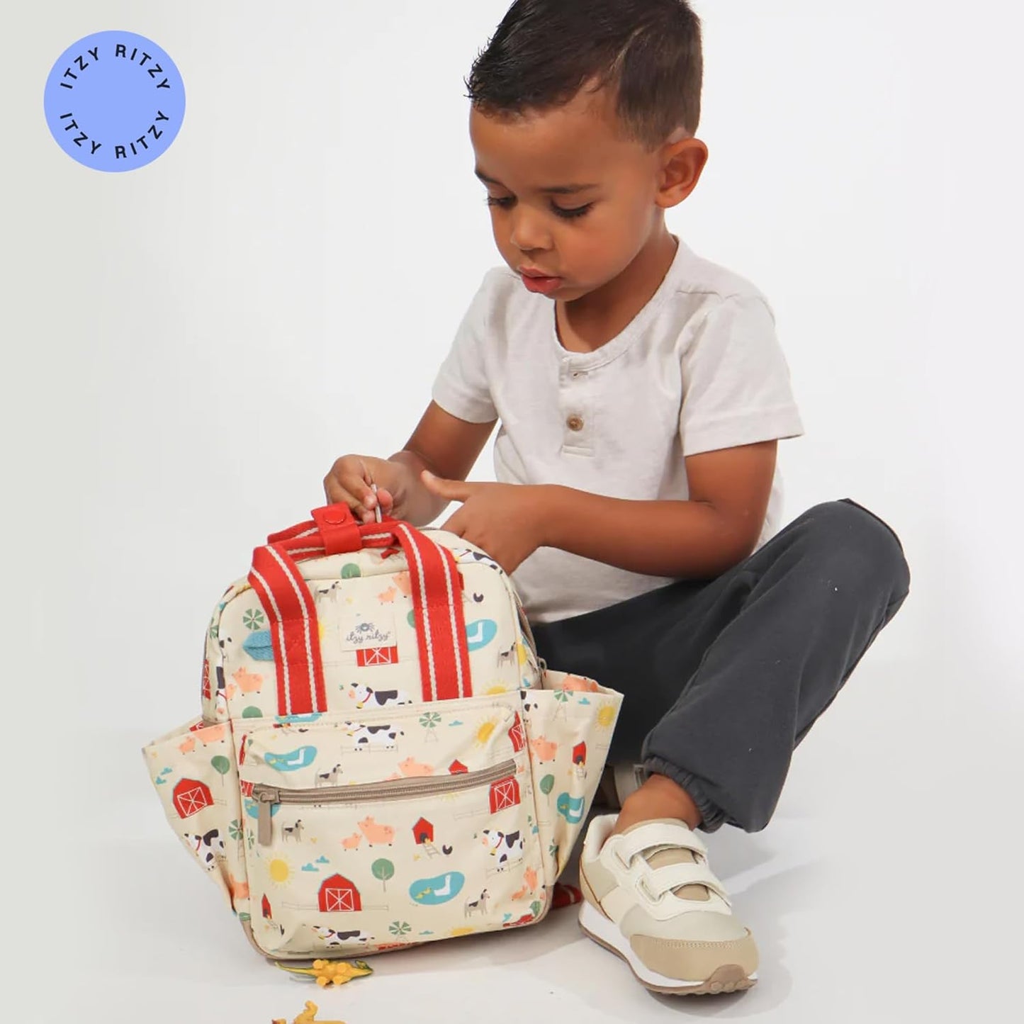 Itzy Ritzy Toddler Backpack - Daycare Bag - Features Adjustable Shoulder Straps, 2 Side Pockets & Spacious Interior with Wipeable Fabric Lining & Name Label, Strawberry Backpack