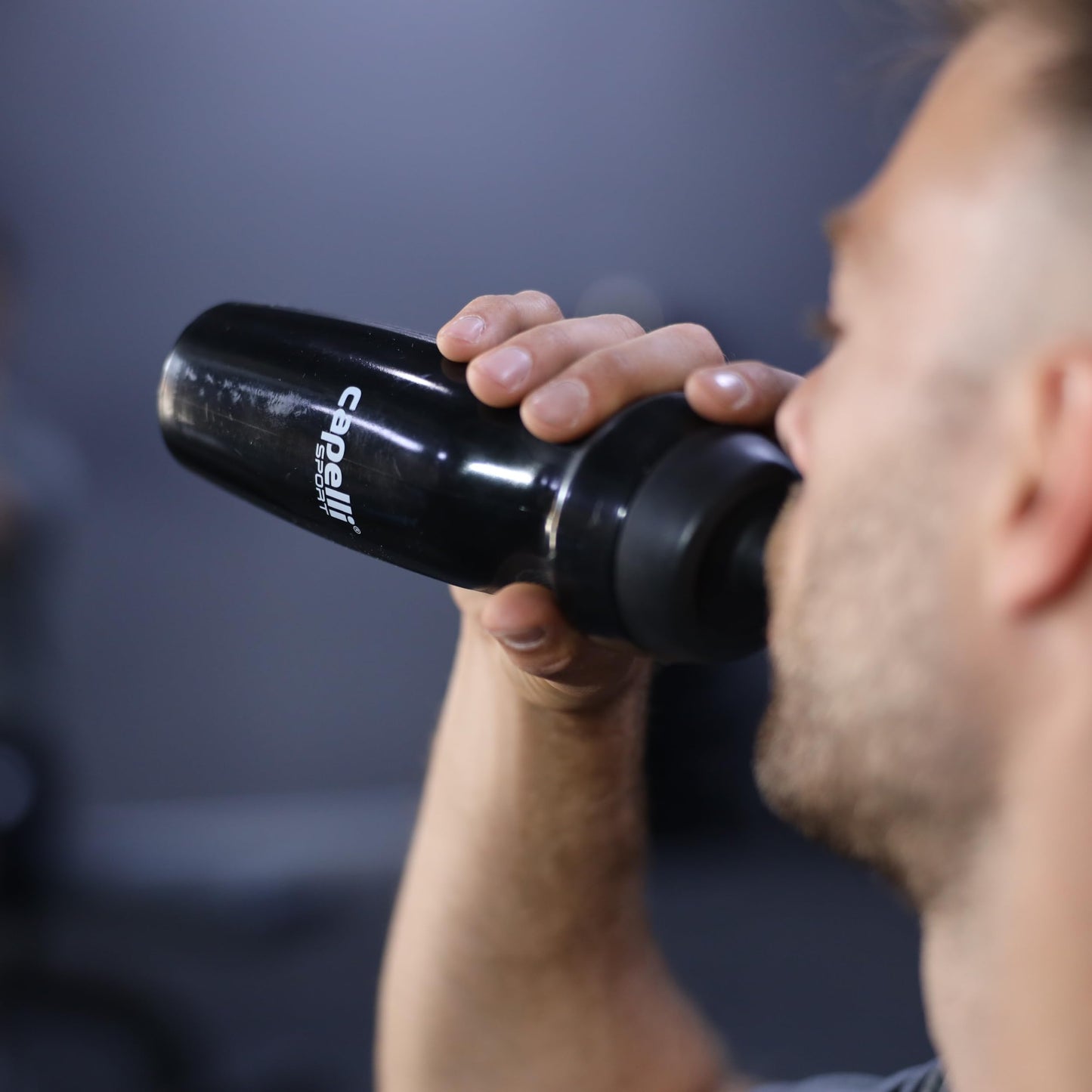 Capelli Sport Sports Water Bottle, Plastic Squeeze Water Bottle with Easy Open Nozzle and Grip Panels, Black, 18.5oz