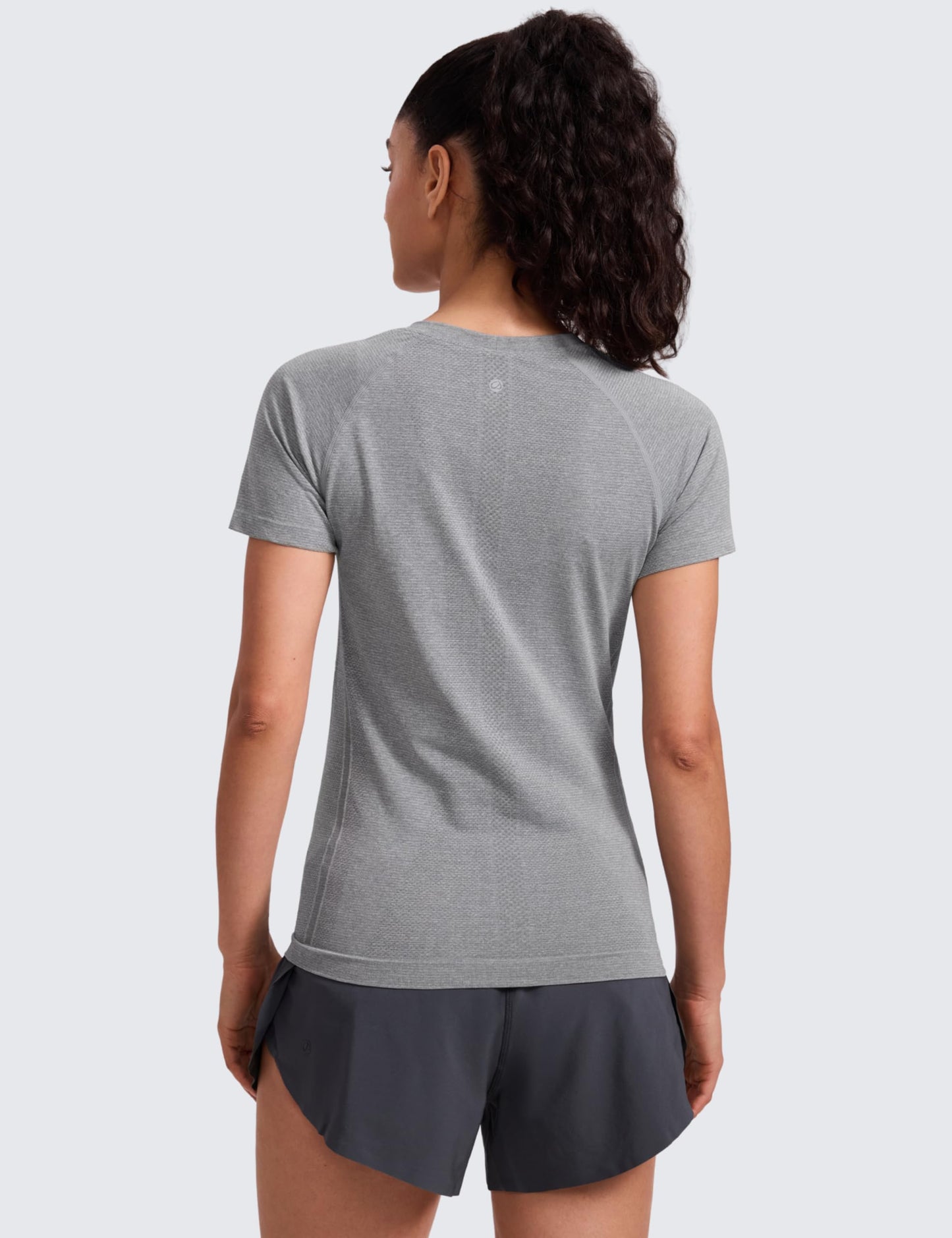 CRZ YOGA Seamless Workout Tops for Women Hip Length - Athletic Running Gym Yoga Short Sleeve Shirts Breathable Crewneck Tees Slate Grey Marl Large