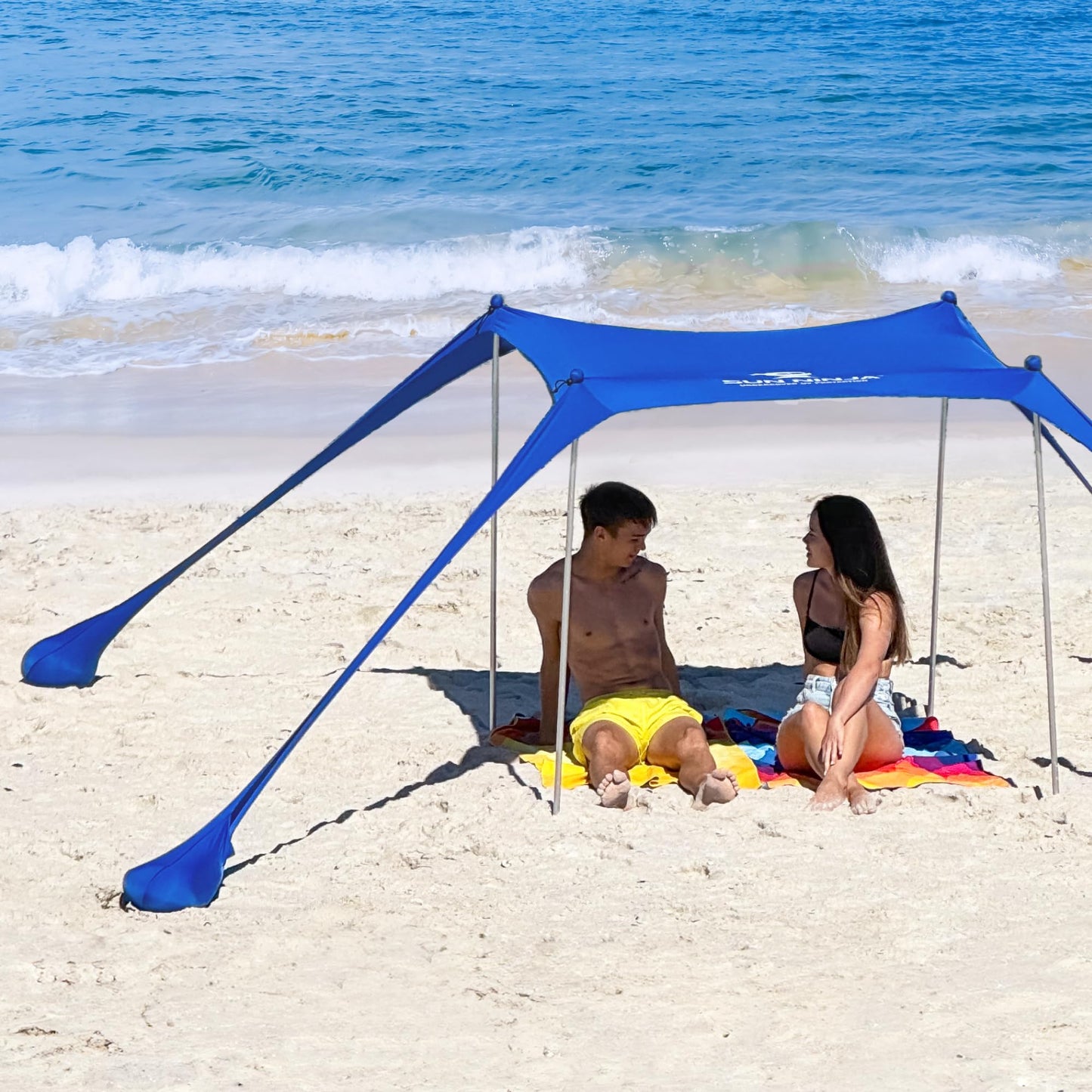 SUN NINJA Beach Tent Shelter with UPF50+ Protection, Includes Sand Shovel, Ground Pegs, Stability Poles, Outdoor Pop Up Shade Canopy for Camping, Fishing, Backyard Fun (Royal Blue, 5x5 FT 4 Pole)