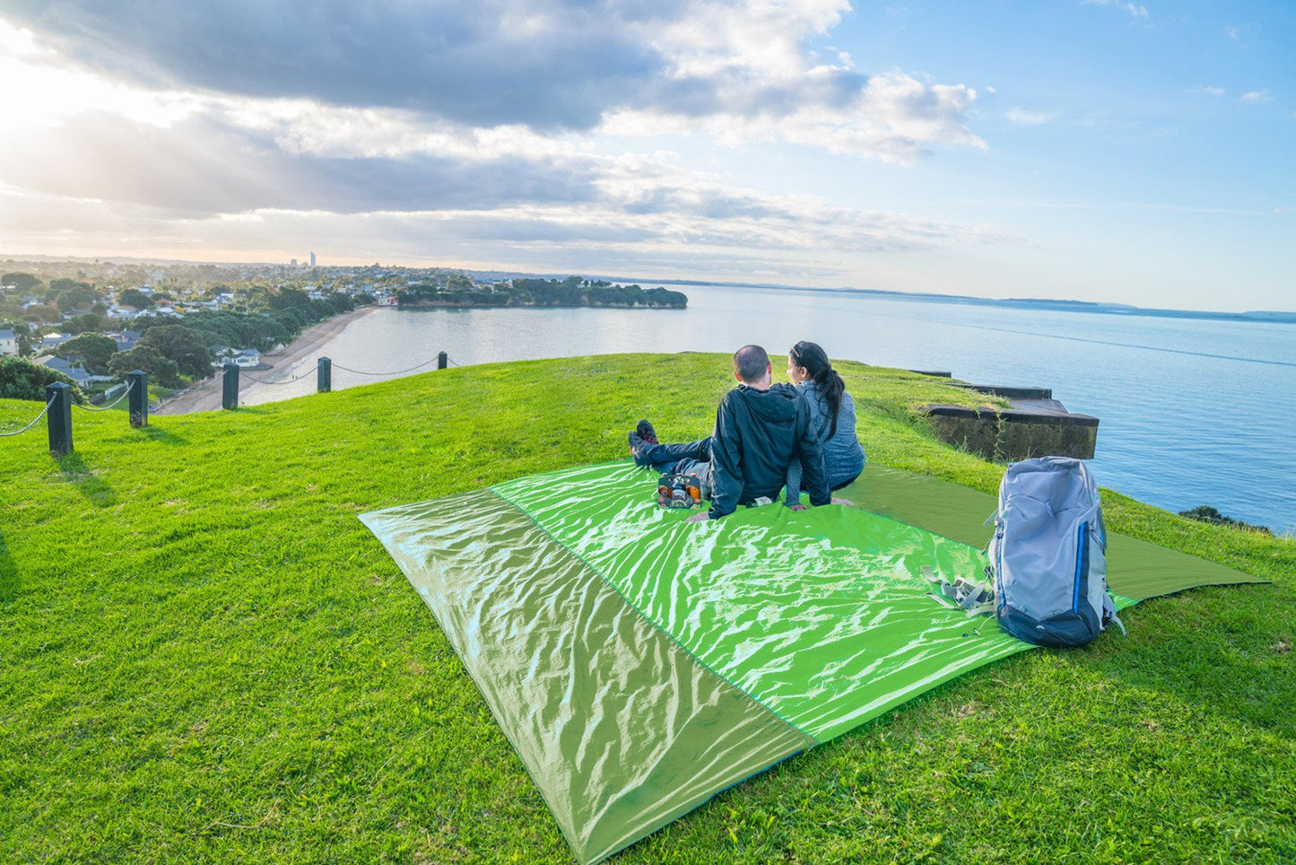 WEKAPO Beach Blanket - Sandproof Waterproof Extra Large Beach Mat | Oversized Sand-Free Lightweight Quick-Drying | Beach Vacation Essentials with Stakes & Corner Pockets (Green, 9x7 FT)