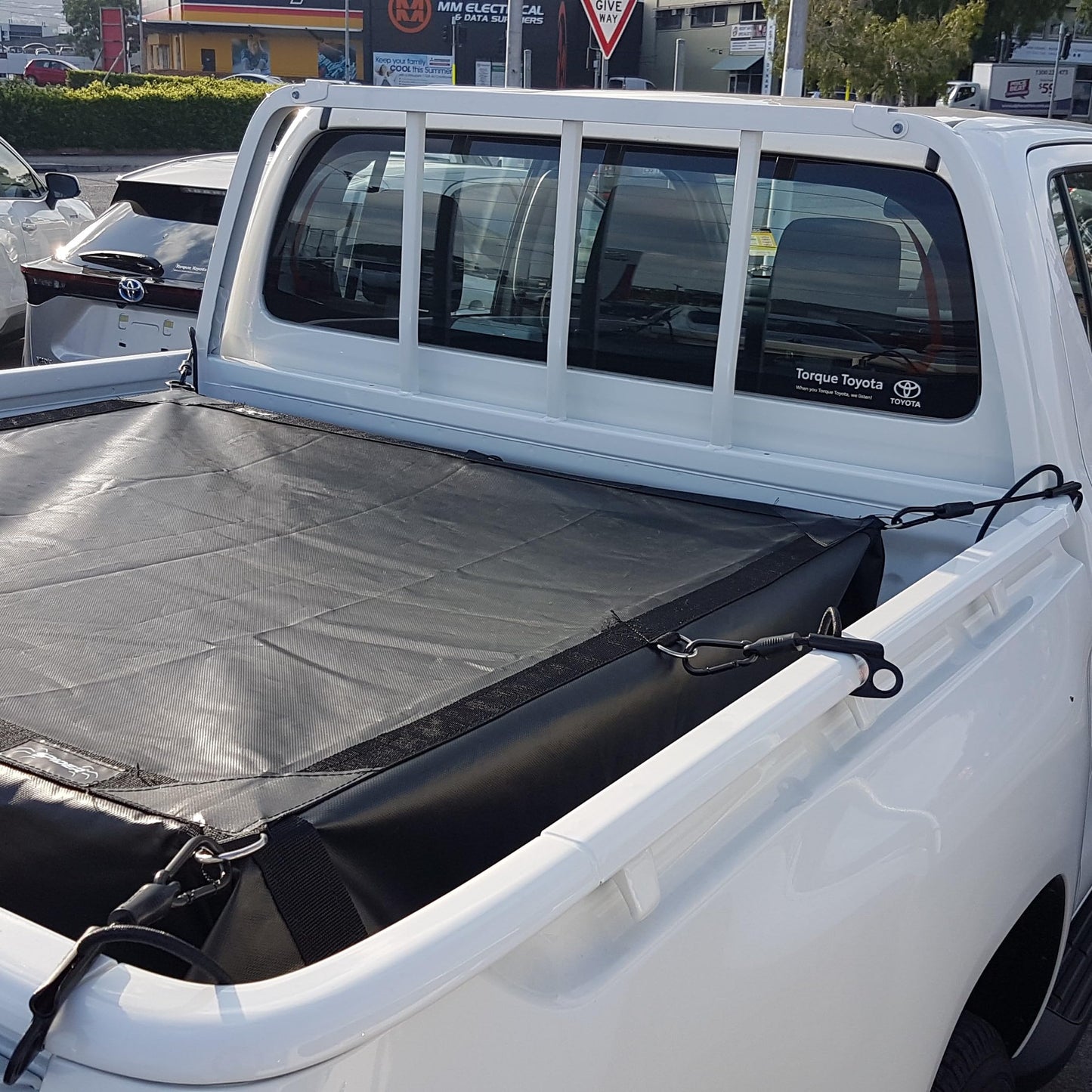 SPIDER Pickup Truck Bed Tarp (7’1” W x 7’6” L) - Heavy Duty Black Solid Waterproof Cargo Net Cover - Detachable Quick Adjust Tie Downs - Fits Short Bed (5'6") and Trailers