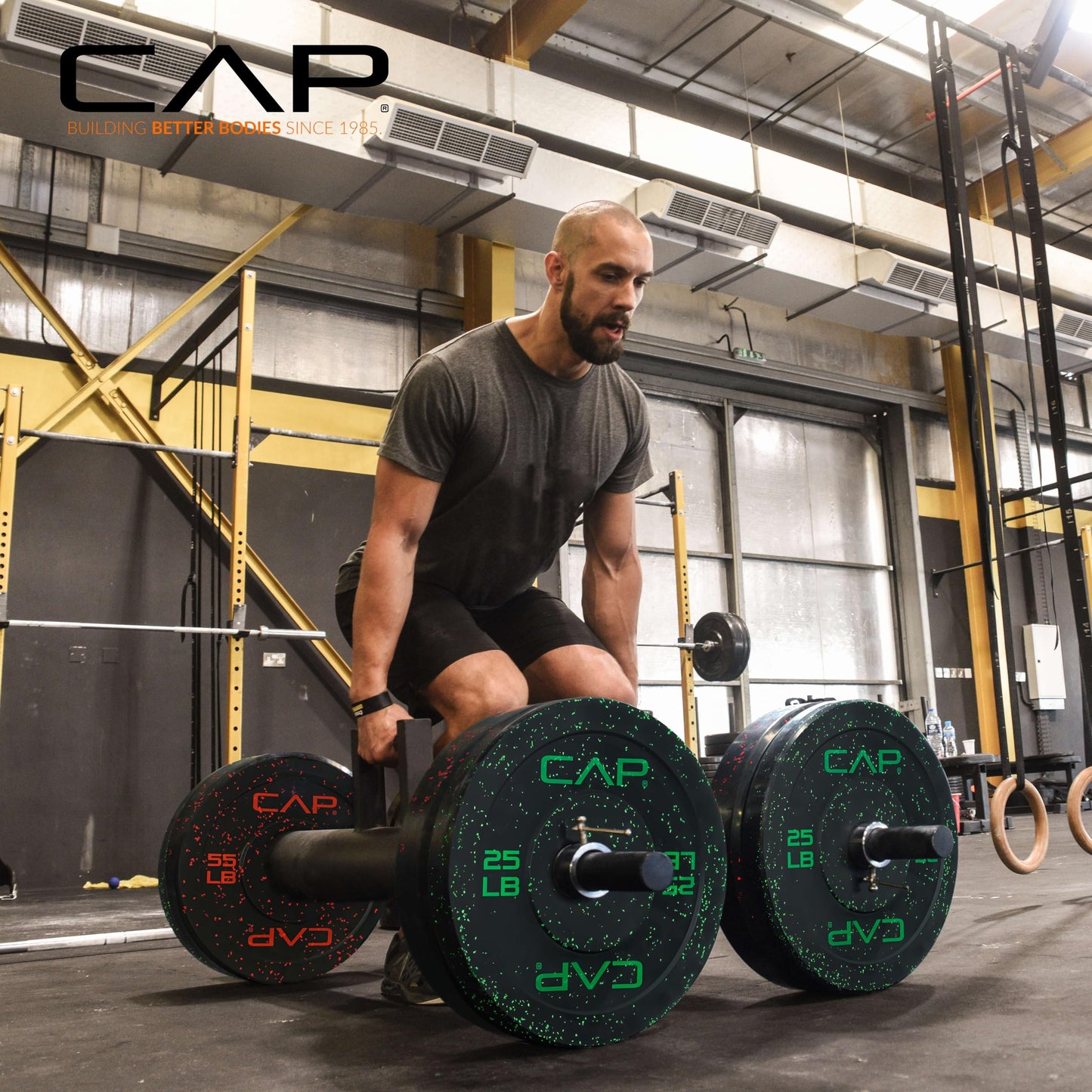 CAP Economy 25 lb Pair Olympic Bumper Plate, Medium Bounce Rubber Weight Plate with Steel Hub, Color Fleck Design, 2-Inch Olympic Barbell Compatible for Strength Training, Weightlifting & Home Gym Workouts.