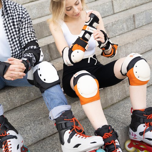 SKATEWIZ Knee and Elbow Pads Adult - Skating Protective Gear Adult Knee and Elbow Pads Set with Wrist Pads - SHIELD - Size M/L Orange - Roller Skate Protective Gear for Women & Men