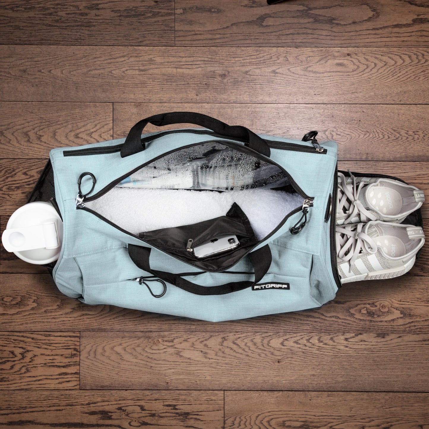 Fitgriff® Gym Bag for Men & Women with Shoe & Wet Compartment - Duffle Bag for Travel, Sports, Fitness & Workout (Cyan, 23 x 12 x 12″ (Medium))